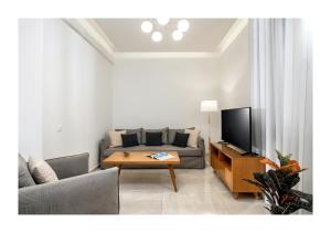 TV a/nebo společenská místnost v ubytování Casa di Ariadne
