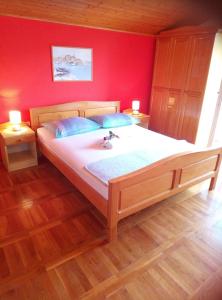 Postel nebo postele na pokoji v ubytování Apartments Dalmatia