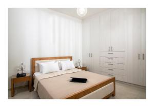 Postel nebo postele na pokoji v ubytování Casa di Ariadne