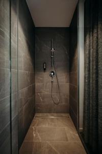 A bathroom at Hotel VIEW - incl Joker Card in Summer