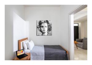 Postel nebo postele na pokoji v ubytování Casa di Ariadne