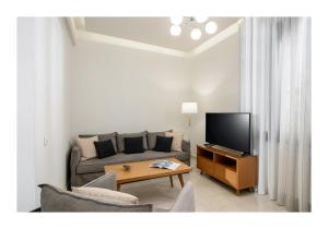 TV a/nebo společenská místnost v ubytování Casa di Ariadne