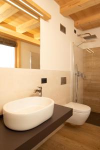 Ett badrum på B&B Ecohotel Chalet des Alpes