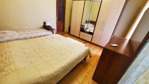 Postel nebo postele na pokoji v ubytování Guest House Lazika