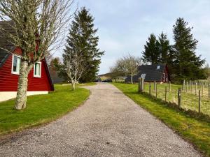 Κήπος έξω από το Highland Glen Lodges +19 φωτογραφίες