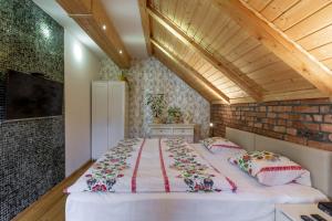 Posteľ alebo postele v izbe v ubytovaní Apartamenty Pod Skocznią