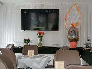 TV a/nebo společenská místnost v ubytování Hotel Presidente