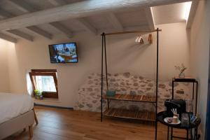 a bedroom with a shower in the corner of a room at Sun Garda in Ponti Sul Mincio