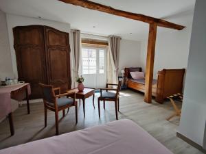 Postel nebo postele na pokoji v ubytování Domaine De La Cour Vautier