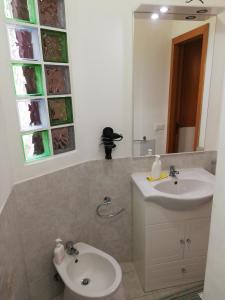 Kúpeľňa v ubytovaní Casa dell'aquila Barocca + 27 fotografií