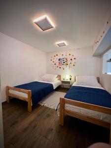 Katil atau katil-katil dalam bilik di Apartman Cvjetni