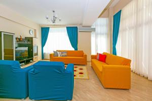 TV a/nebo společenská místnost v ubytování Paradise Town Villa Daisy