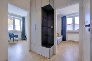 Televízia a/alebo spoločenská miestnosť v ubytovaní Nowy Apartament, dobrze wyposażony, blisko w górki, dostęp na kod