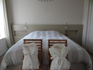 Postel nebo postele na pokoji v ubytování B&B Les Tilleuls