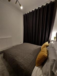 Ένα ή περισσότερα κρεβάτια σε δωμάτιο στο Modern & Bright, G/F, 1BR APT. Real Hidden Gem