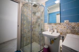 a bathroom with a shower and a sink at ELISA Dependance Centro in Vietri sul Mare