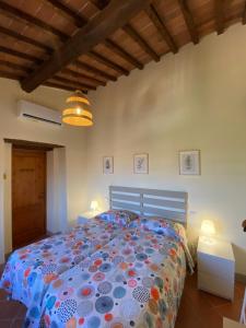 A bed or beds in a room at Montagnana Country House Még 30 kép