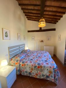 A bed or beds in a room at Montagnana Country House
