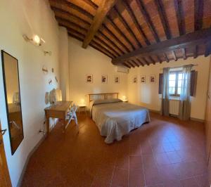 A bed or beds in a room at Montagnana Country House