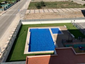 The swimming pool at or close to Beautiful apartment with pool near the beach