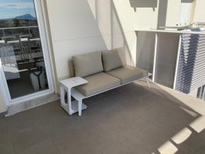 A balcony or terrace at Beautiful apartment with pool near the beach