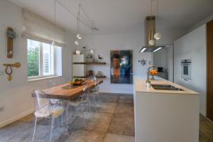 Kuchyňa alebo kuchynka v ubytovaní FRAMAR apartment