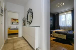 Posteľ alebo postele v izbe v ubytovaní FRAMAR apartment