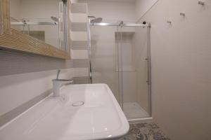 Kúpeľňa v ubytovaní FRAMAR apartment