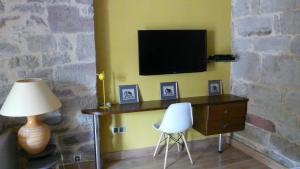 TV a/nebo společenská místnost v ubytování La Bastidie
