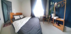 Postel nebo postele na pokoji v ubytování Hello Dalat Hostel