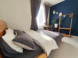 Postel nebo postele na pokoji v ubytování Hello Dalat Hostel