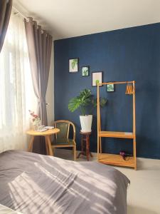 Postel nebo postele na pokoji v ubytování Hello Dalat Hostel
