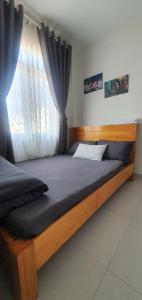 Postel nebo postele na pokoji v ubytování Hello Dalat Hostel
