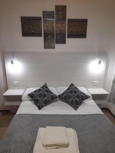A bed or beds in a room at Departamento Céntrico en Mendoza