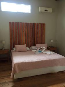 Postel nebo postele na pokoji v ubytování Origenes Spa & Lodging