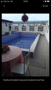 a small and medium sized pool located at roof top at Sunmiles Condominium in Calamba