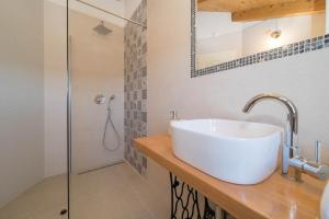 Kúpeľňa v ubytovaní Villa Poji