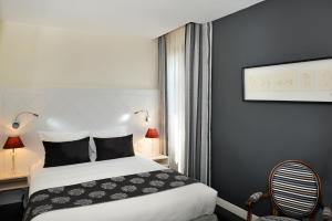 Cama o camas de una habitación en Le Saint-Jacques