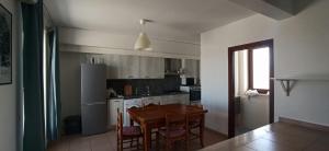 Kuchyň nebo kuchyňský kout v ubytování Attico Oleandro - Penthouse loft with sea view - Nova Siri, Basilicata