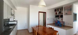 Kuchyň nebo kuchyňský kout v ubytování Attico Oleandro - Penthouse loft with sea view - Nova Siri, Basilicata + 9 fotografií