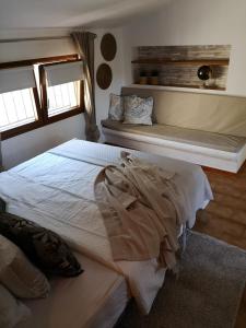 Ein Bett oder Betten in einem Zimmer der Unterkunft Casa Jetizo