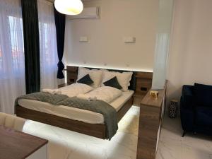 Postel nebo postele na pokoji v ubytování La Luna Premium Deluxe Apartment with Pool & Jacuzzi, Bikes and Covered Parking