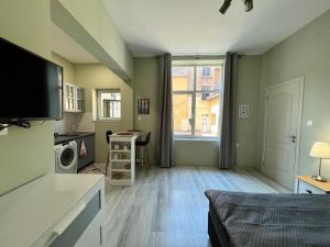 A television and/or entertainment centre at Prista guest rooms