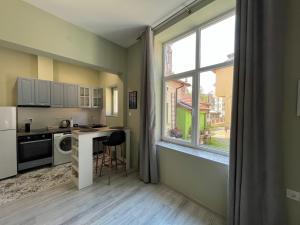 A kitchen or kitchenette at Prista guest rooms Még 8 kép