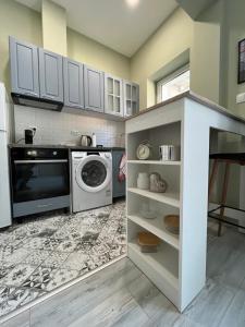 A kitchen or kitchenette at Prista guest rooms