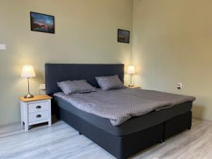 A bed or beds in a room at Prista guest rooms