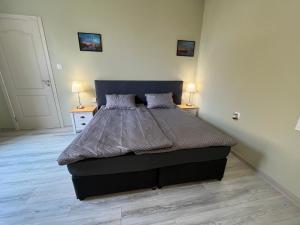 A bed or beds in a room at Prista guest rooms
