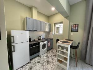 A kitchen or kitchenette at Prista guest rooms