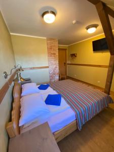 Postel nebo postele na pokoji v ubytování Sepikoja Guest House