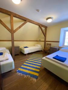 Postel nebo postele na pokoji v ubytování Sepikoja Guest House